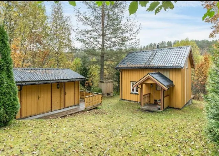 Rindalsskogen Feriehus *